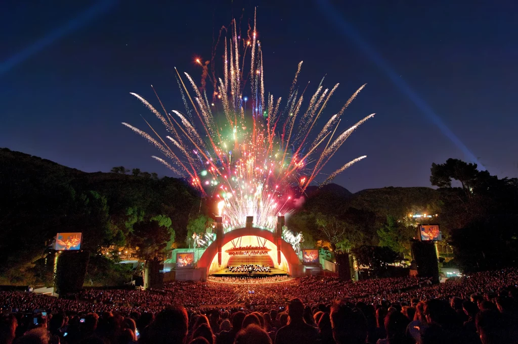 Fireworks display above the Hollywood Bowl during a nighttime concert.