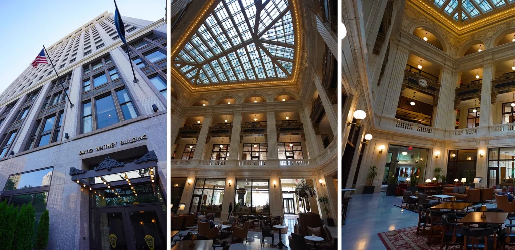 Fassade und Atrium des David Whitney Buildings mit Glasdach und klassischem Design.