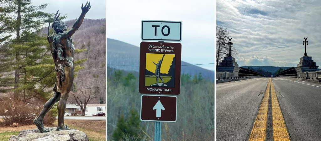 „Hail to the Sunrise“-Denkmal, Straßenschild des Mohawk Trail Scenic Byway und Blick über eine leere Straße auf einer Brücke entlang des Trails in Massachusetts.