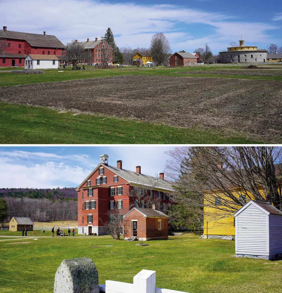 Historisches Hancock Shaker Village bei Pittsfield, Massachusetts – Blick auf Farmgebäude, Wohnhäuser und die berühmte Round Stone Barn.