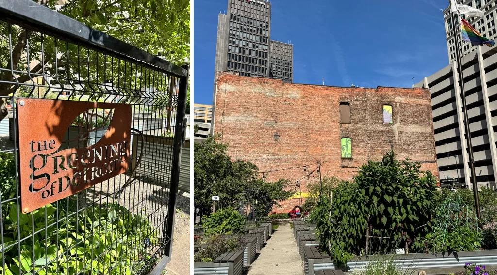 Urban Garden in Downtown Detroit mit Gemüsebeeten und Blick auf hohe Backsteinmauer und umliegende Hochhäuser.