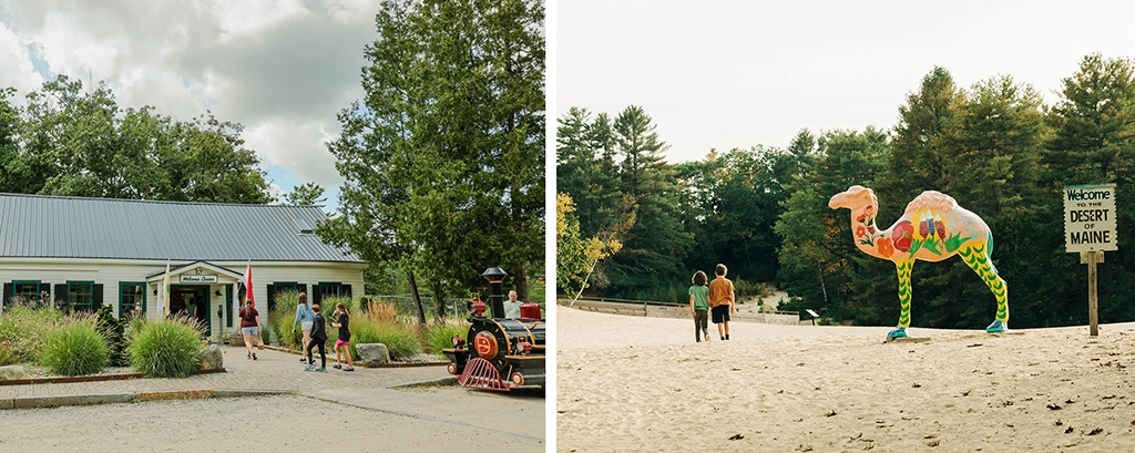 Besucher am Desert of Maine in Freeport mit dem bunten Kamel-Skulptur und dem historischen Welcome Center im Hintergrund.